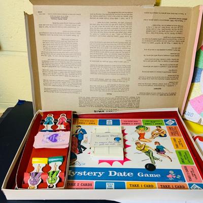 LOT 369: Collection of Games Including Vintage Mystery Date Game, Twister, Simon and More