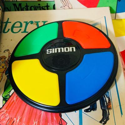 LOT 369: Collection of Games Including Vintage Mystery Date Game, Twister, Simon and More