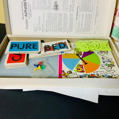 LOT 369: Collection of Games Including Vintage Mystery Date Game, Twister, Simon and More