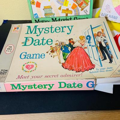 LOT 369: Collection of Games Including Vintage Mystery Date Game, Twister, Simon and More