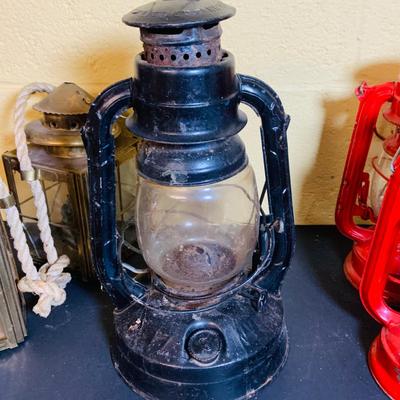 LOT 370: Collection of Oil Burning Lamps/Lanterns Including a Two Ship’s Lamps and Rail Road Lanterns