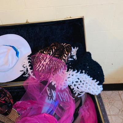 LOT 373: Vintage Black Steamer Trunk Full of Hats and Scarfs