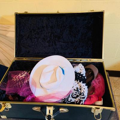 LOT 373: Vintage Black Steamer Trunk Full of Hats and Scarfs