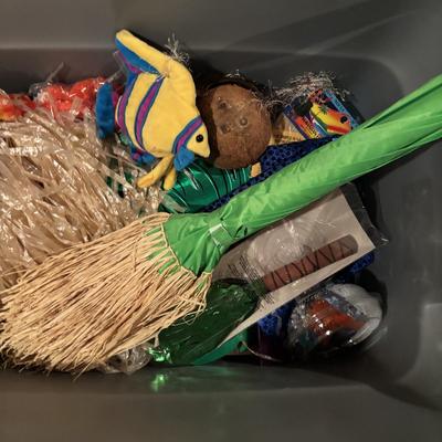 LOT 377: Luau Decor and More: Hula Hoops, Color Felt Fish Hats. Seashells, Child Size Hula Skirts and More