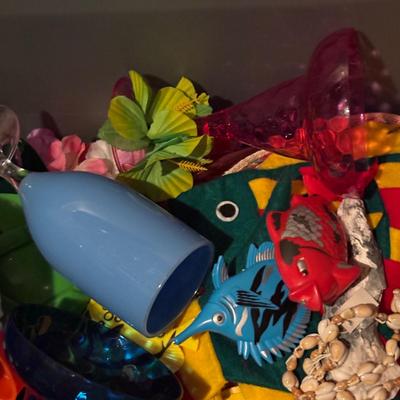 LOT 377: Luau Decor and More: Hula Hoops, Color Felt Fish Hats. Seashells, Child Size Hula Skirts and More