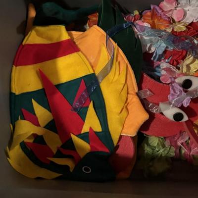 LOT 377: Luau Decor and More: Hula Hoops, Color Felt Fish Hats. Seashells, Child Size Hula Skirts and More