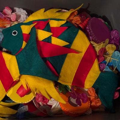 LOT 377: Luau Decor and More: Hula Hoops, Color Felt Fish Hats. Seashells, Child Size Hula Skirts and More