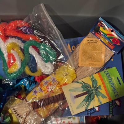 LOT 377: Luau Decor and More: Hula Hoops, Color Felt Fish Hats. Seashells, Child Size Hula Skirts and More