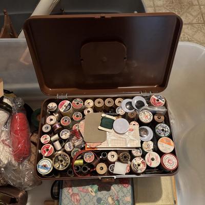 LOT: 378: Large Crafting & Sewing Lot: Fabric, Sewing Mat, Thread, Crochet Needles etc.