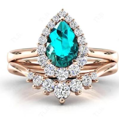Paraiba Tourmaline Pear Cut Halo Bridal Set
