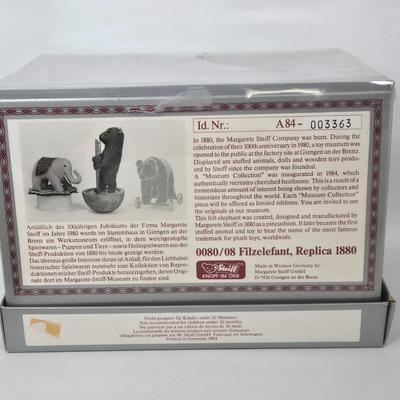 LOT 80: Steiff Replica of 1880 Felt Elephant, Fairy Bear, Wool Pompom Bird, Red Bear, and Steiff Cub Teddy Bear in it's Original Box