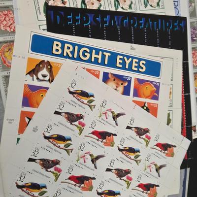 LOT 95: Mint Sets of Commemorative Stamps and More