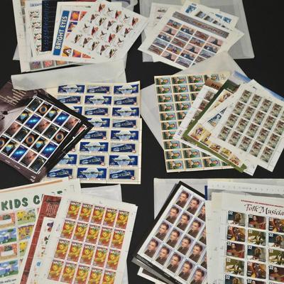LOT 95: Mint Sets of Commemorative Stamps and More
