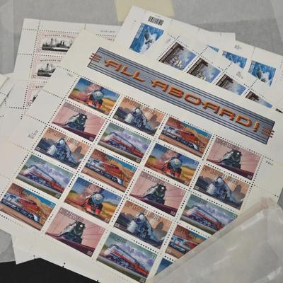 LOT 95: Mint Sets of Commemorative Stamps and More