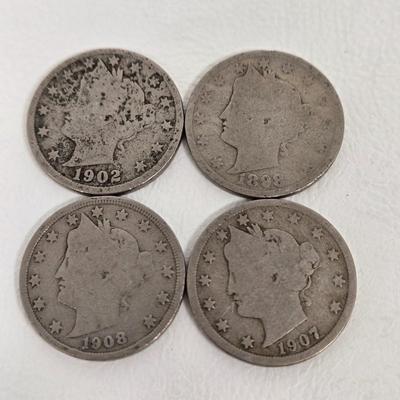LOT 106: Ten Liberty V Nickels and 1882 Shield Nickel