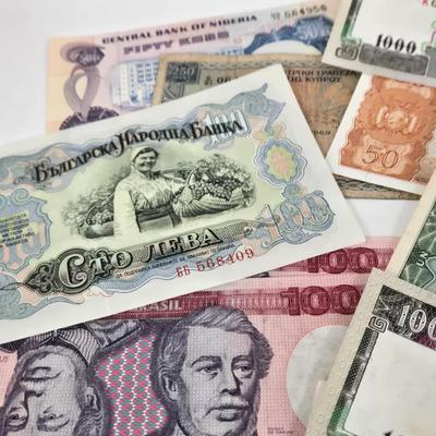 LOT 112: Coins and Bills From All Over the World