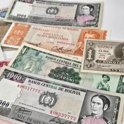 LOT 112: Coins and Bills From All Over the World