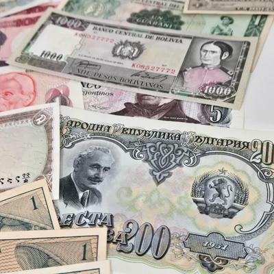 LOT 112: Coins and Bills From All Over the World
