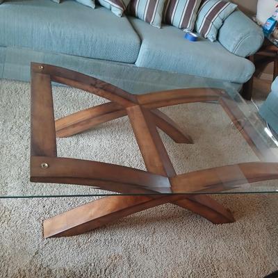 Modern = Glass-Top Coffee Table with Sculptural Wood Base