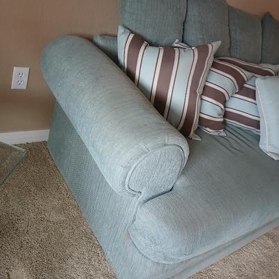 Teal Upholstered Sofa with Accent Pillows