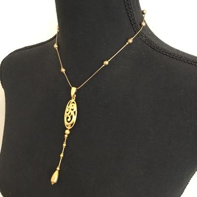 Vintage and Klein, gold toned satin gold toned station necklace
