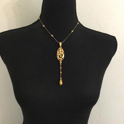 Vintage and Klein, gold toned satin gold toned station necklace