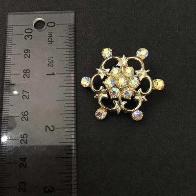 Vintage Iridescent star stone brooch