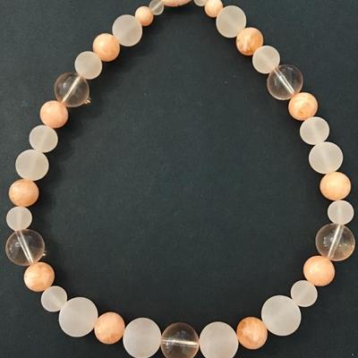 Large chunky peach colored beaded necklace