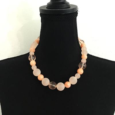 Large chunky peach colored beaded necklace
