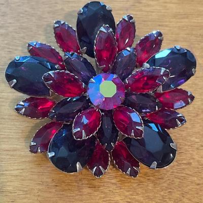 Heavy stone brooches
