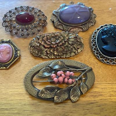 Brass tone oval pendants