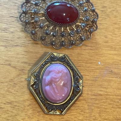 Brass tone oval pendants