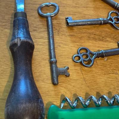 Vintage keys, button hooks and cork screw