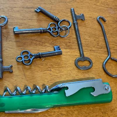 Vintage keys, button hooks and cork screw