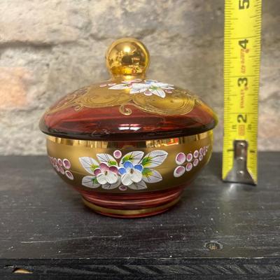Sale Photo Thumbnail #335: Beautiful little cranberry gilt puff box with raised enamel flowers. Gorgeous!!!