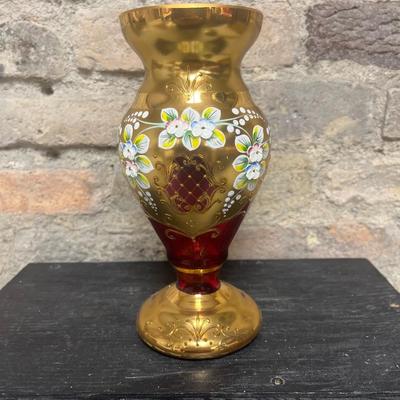 Sale Photo Thumbnail #341: Outstanding cranberry gilt vase  with raised enamel flowers.
