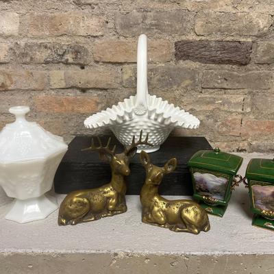 Sale Photo Thumbnail #344: Excellent Fenton milk glass hobnail milk glass basket, Anchor Hocking milk glass paneled covered candy dish, pair of vintage brass deer, and pair of Thomas Kincade canisters