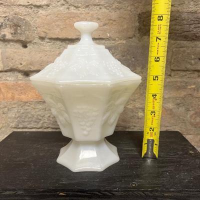Sale Photo Thumbnail #349: Excellent Fenton milk glass hobnail milk glass basket, Anchor Hocking milk glass paneled covered candy dish, pair of vintage brass deer, and pair of Thomas Kincade canisters