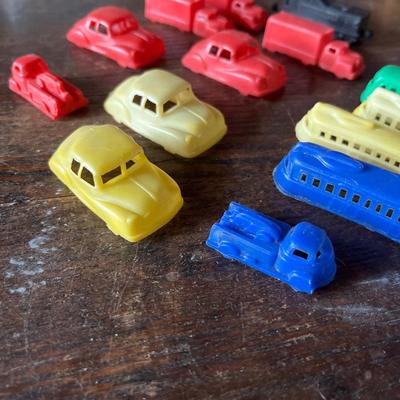Sale Photo Thumbnail #50: A collection of plastic vintage cars, trucks, trains and etc. small.