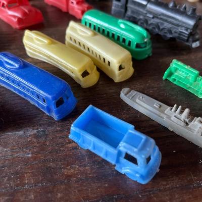 Sale Photo Thumbnail #51: A collection of plastic vintage cars, trucks, trains and etc. small.