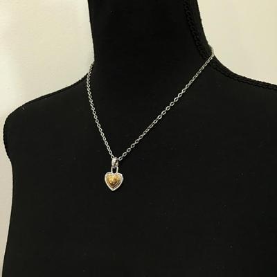 Cute silver and gold toned heart necklace