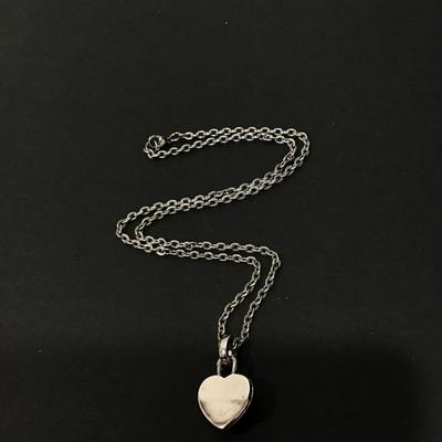 Cute silver and gold toned heart necklace