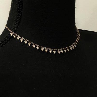 Really cute dainty gold, toned triangle rhinestone necklace