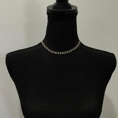 Really cute dainty gold, toned triangle rhinestone necklace