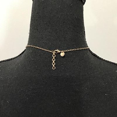 Really cute dainty gold, toned triangle rhinestone necklace