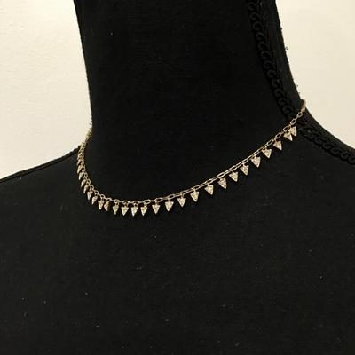 Really cute dainty gold, toned triangle rhinestone necklace