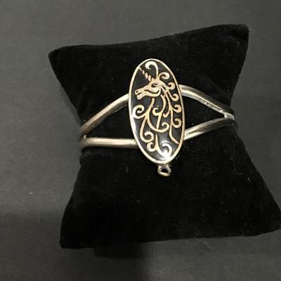 Vintage Unique unicorn Silver tone cuff bracelet, has lots of wear