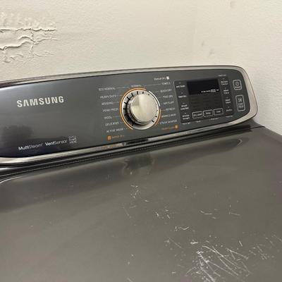 Sale Photo Thumbnail #300: Samsung Electric Dryer, Model DV52J8700EP/A. 

This dryer is in good working condition—see photos of of surface scratches or any wear.