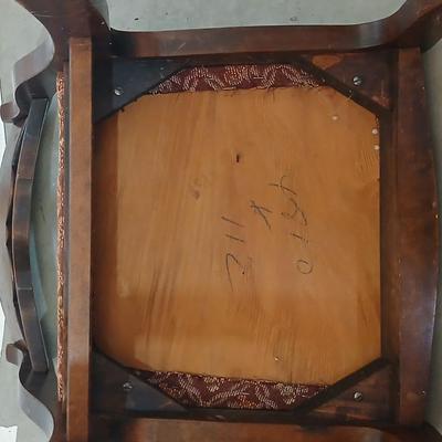 Antique Wooden Rocking Chair with Carved Backrest