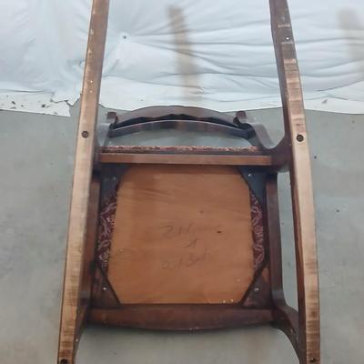 Antique Wooden Rocking Chair with Carved Backrest